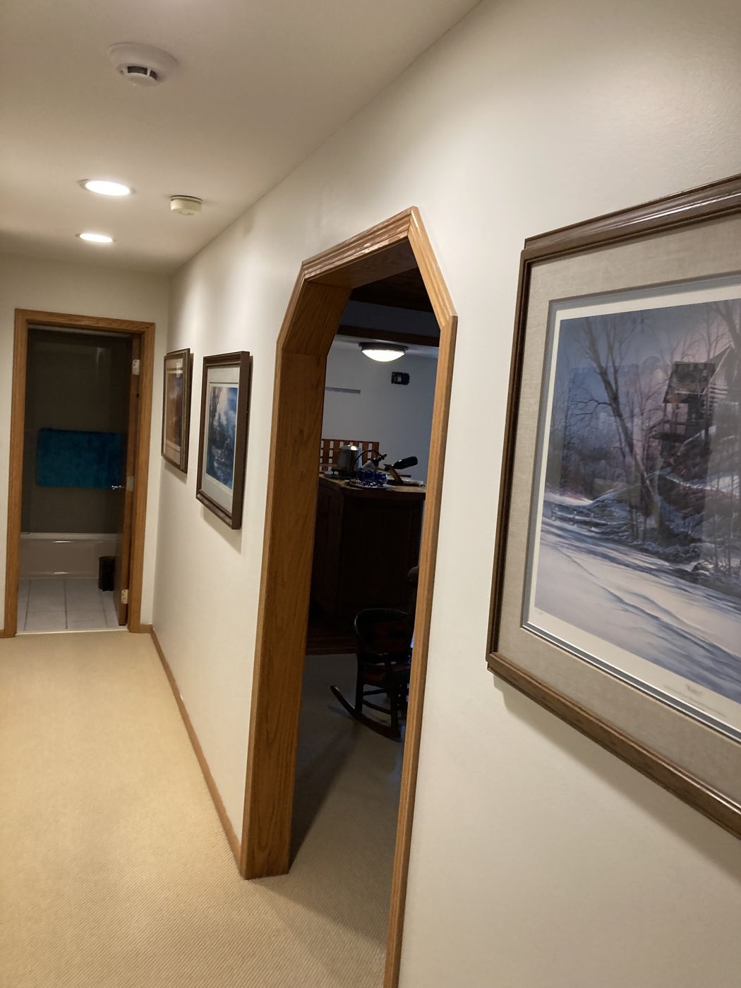 Hallway with an oak arch, walls finished white