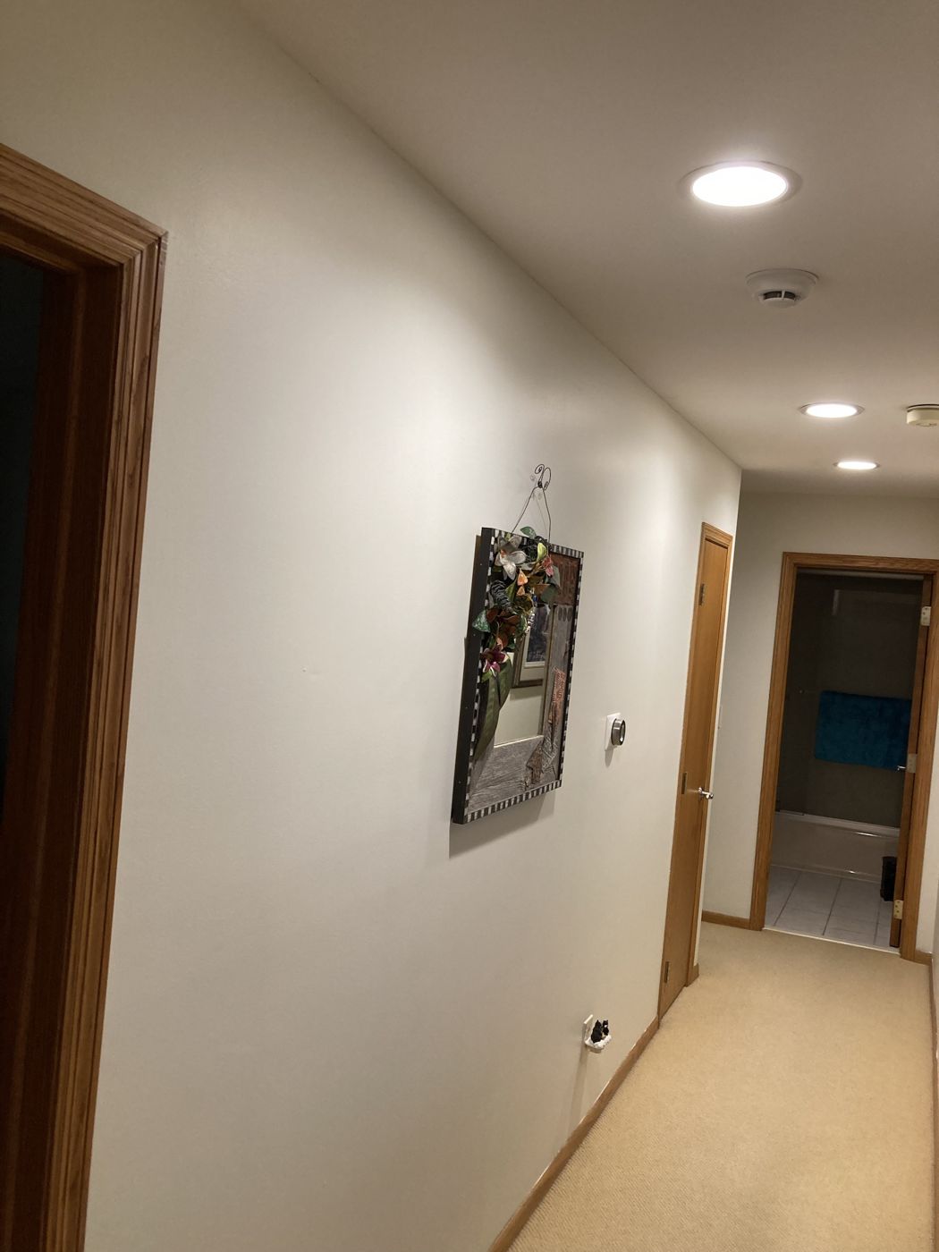 Same hallway finished in a bright white