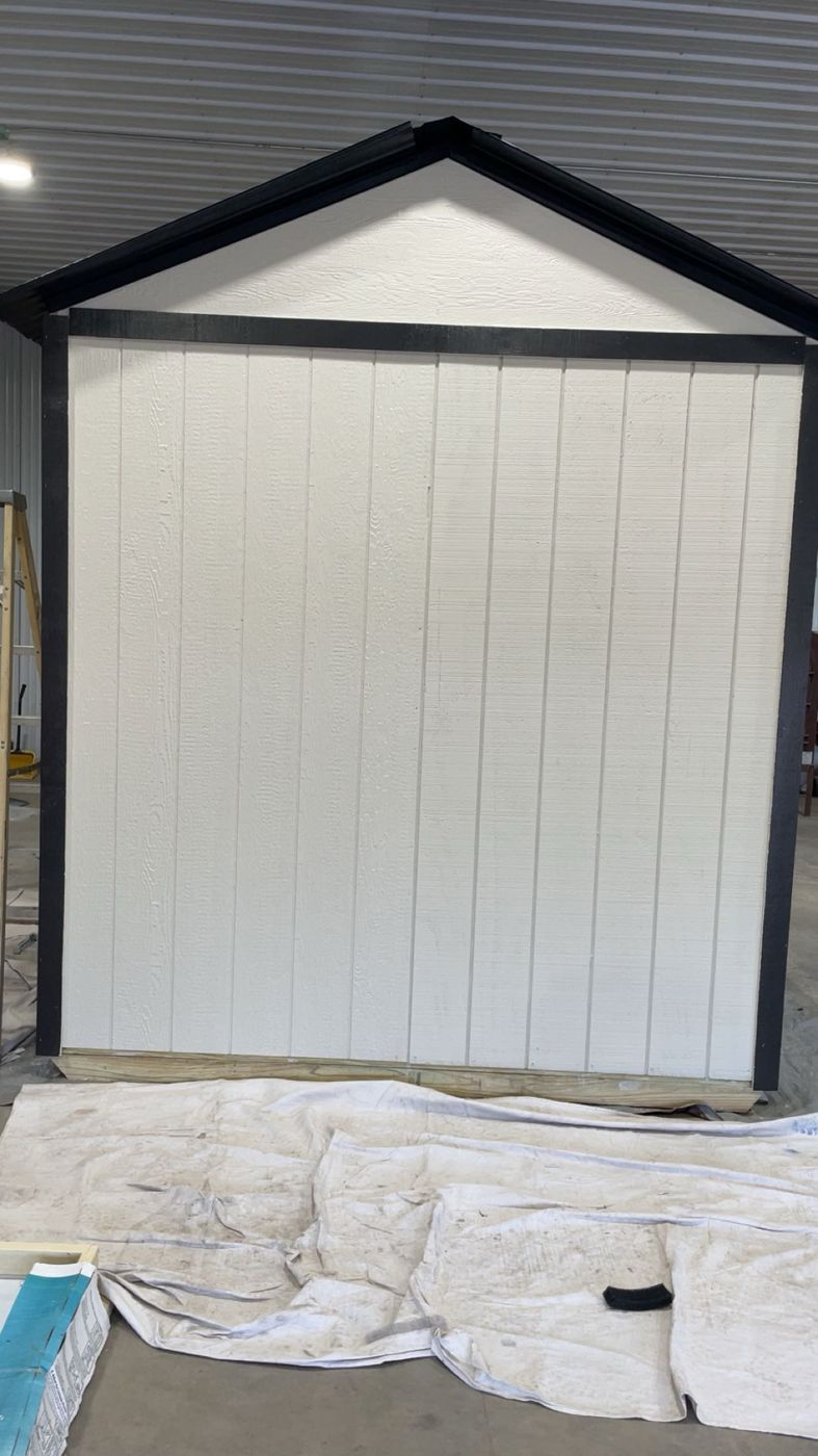 Shed front finished white with black trim